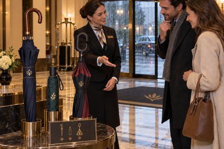 Promotional hotel umbrellas available in the lobby on a rainy day