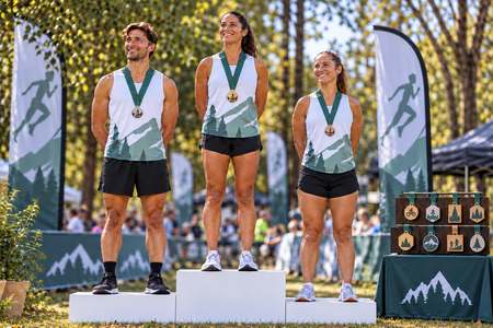 Running podium with personalised gold, silver and bronze medals